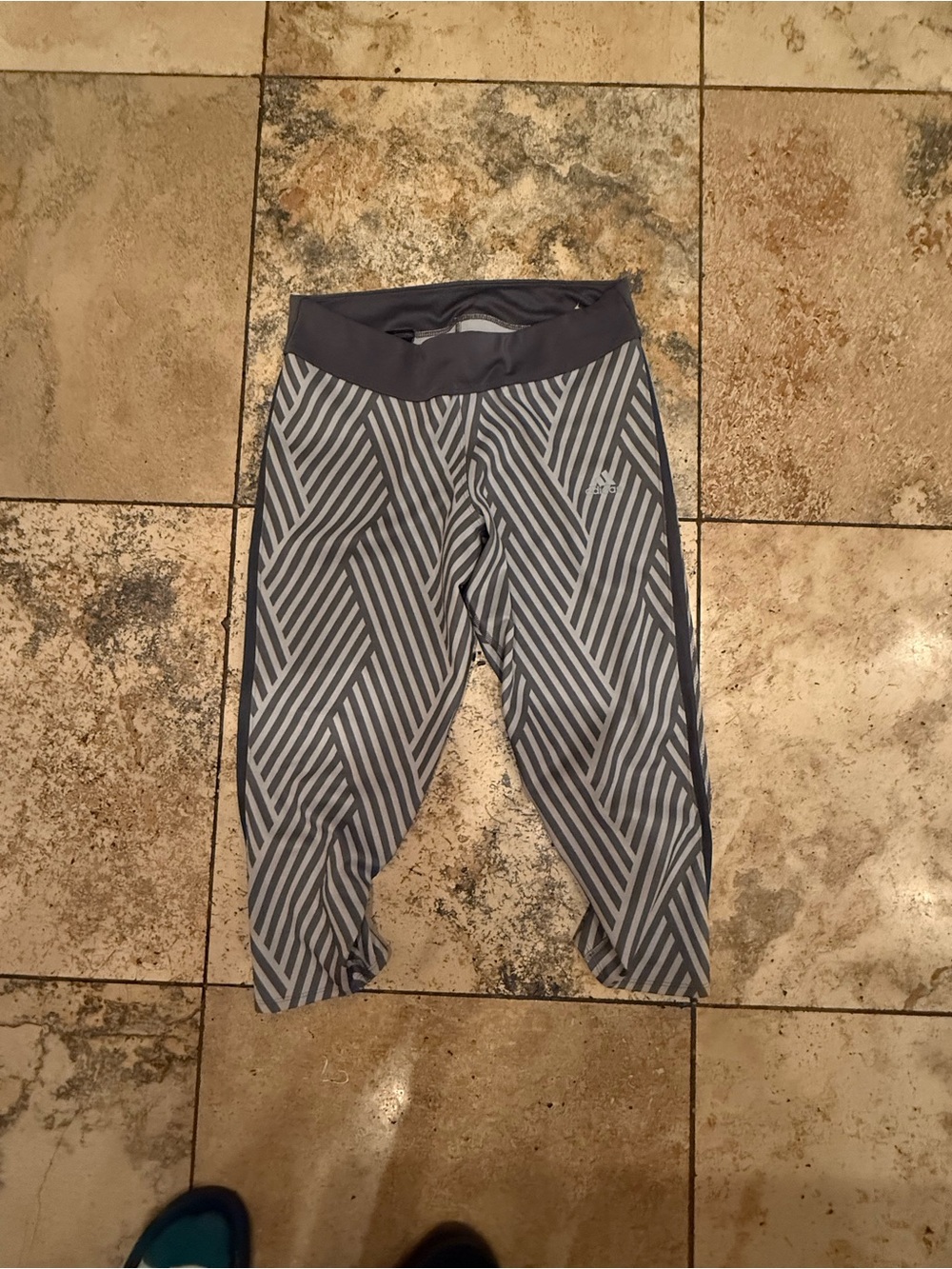 Adidas gray & white diagonal striped capri leggings in a M